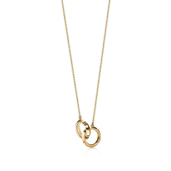 Pendentif Atlas X cercles pleins entrelacés en or jaune 18 carats Tiffany & Co.