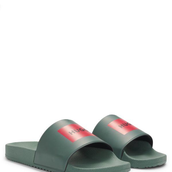 Hugo Boss Mules confectionnées en Italie avec étiquette logotée